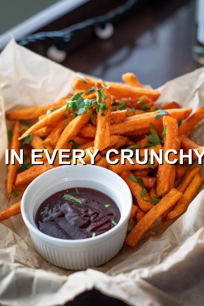 Savory crunchy fries generously drizzled with rich, dark chili sauce, perfect for satisfying any snack craving.