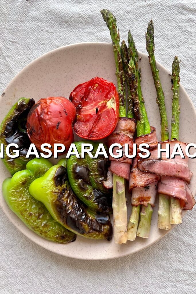 Delicious vegetarian platter bursting with fresh ingredients like crunchy asparagus, succulent cherry tomatoes, earthy mushrooms, and vibrant peppers, all presented beautifully on a pristine plate.