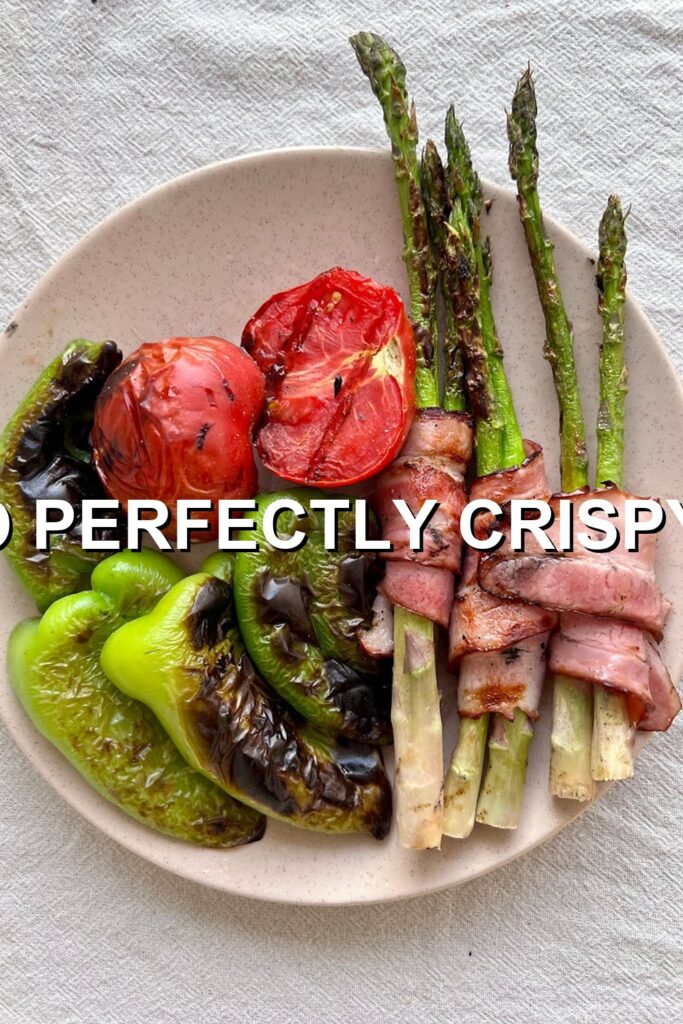 Crispy grilled asparagus tips in a tantalizing, hearty dish with vibrant colors that hint at juicy, smoky flavors.
