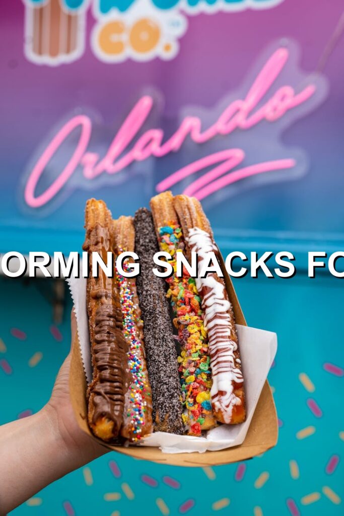 Crunchy, gooey chocolate-dipped churros topped with rainbow sprinkles, served at a cozy, colorful cafe.